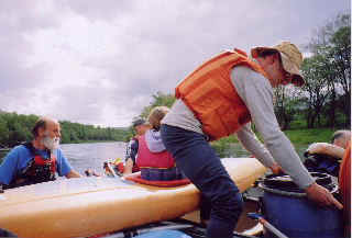 Rafting up - kayaks on top- for cake - River Spey above Aviemore.