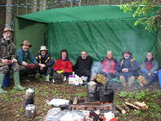 Group photo under tarp