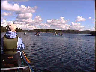 Paddling under cumulus.